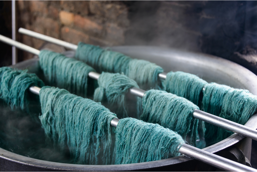 Fabric being dyed and prepared by hand